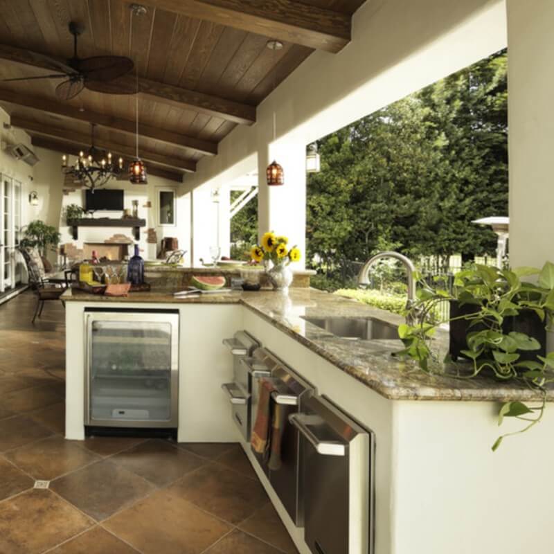 https://cdn.msisurfaces.com/images/blogs/posts/2017/06/barcelona-granite-outdoor-kitchen-countertop-photo-credit-houzz.jpg