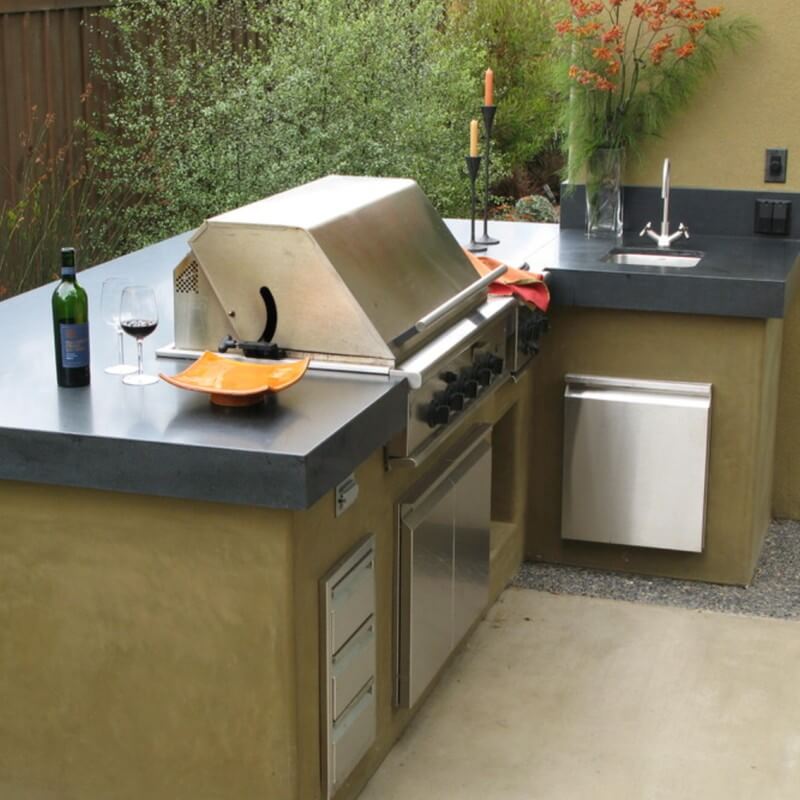 https://cdn.msisurfaces.com/images/blogs/posts/2017/06/nero-mist-honed-granite-countertop-outdoor-kitchen-patio-photo-credit-houzz.jpg