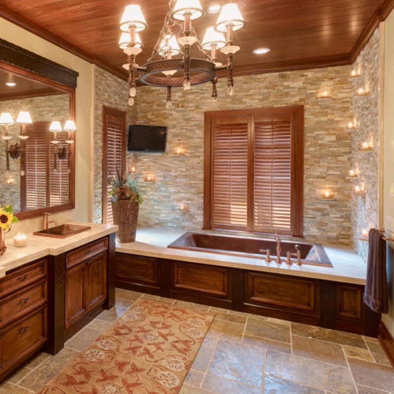 https://cdn.msisurfaces.com/images/blogs/posts/2018/08/fossil-rustic-stacked-stone-bathroom-photo-credit-houzz.jpg