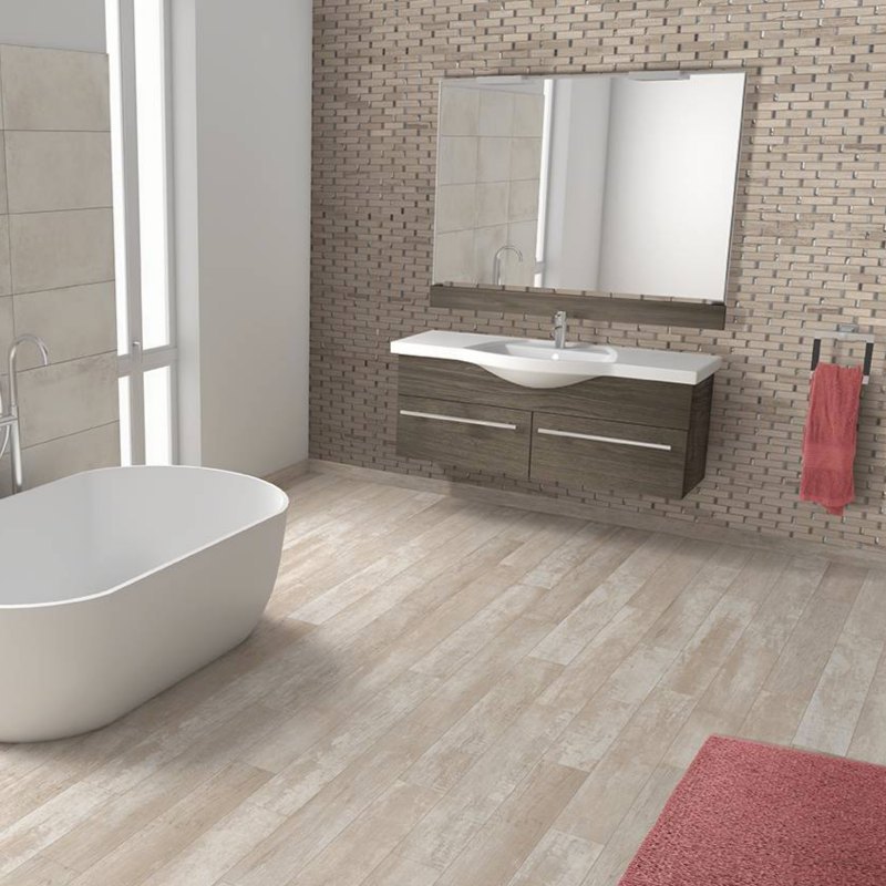 Three dimensional wall tile with wood look plank flooring in bathroom