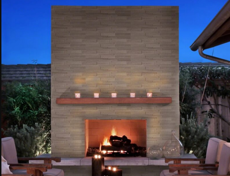 gorgeous outdoor stacked stone fireplace