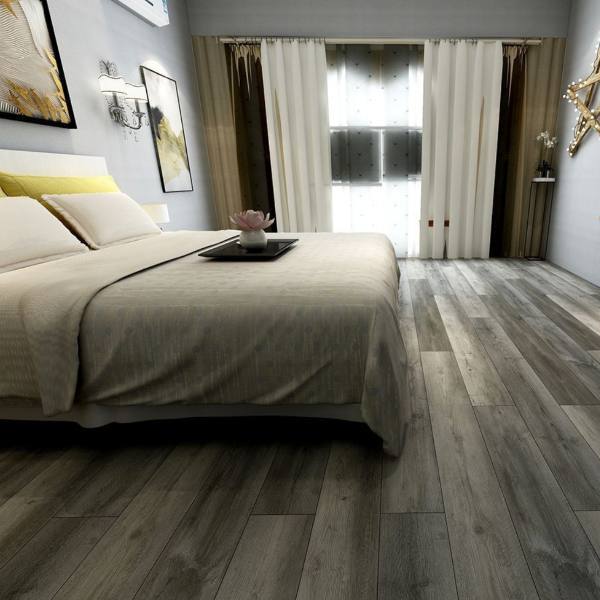 gray vinyl plank flooring in bedroom