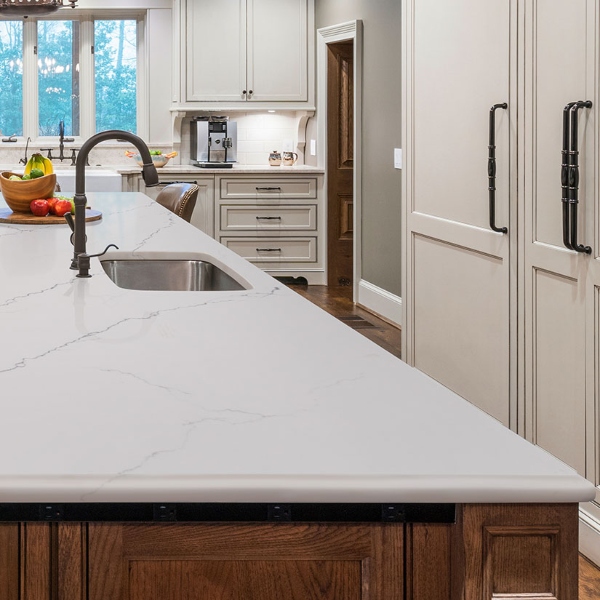 white and soft grey quartz kitchen
