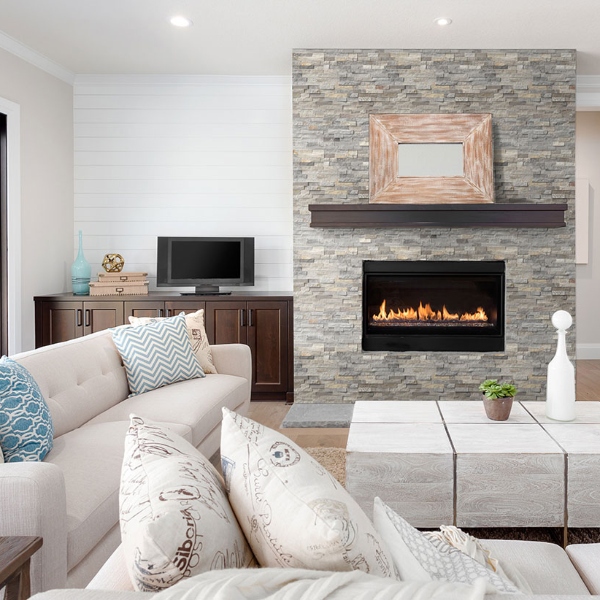 white stacked stone fireplace