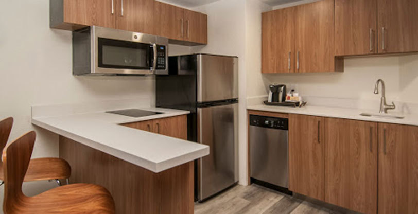 white countertop in hotel room kitchennette