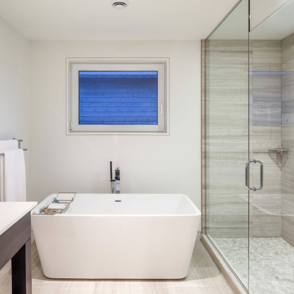 porcelain tile floor and shower in hotel bathroom