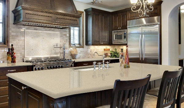 creamy quartz countertop in warm kitchen