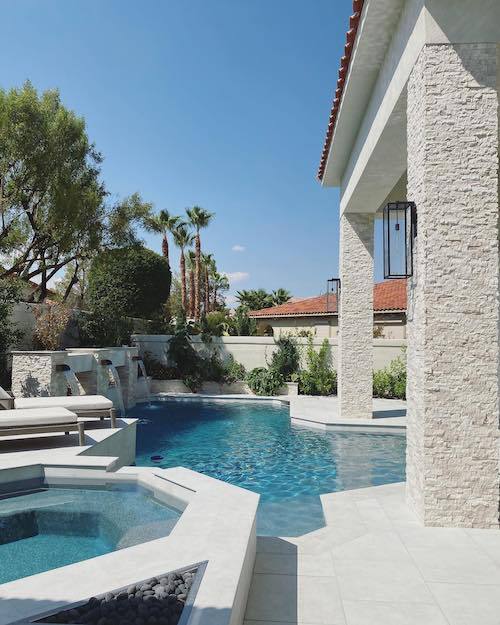 stacked stone pool waterfall