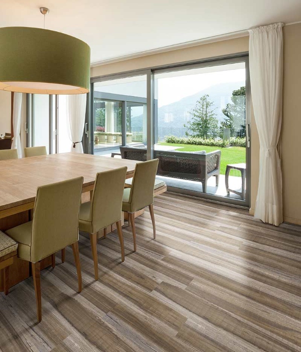 multi colored natural wood flooring in dining room