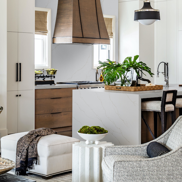 msi-miraggio-gold-soft-and-brilliant-white-quartz-counter-in-kitchen-living-room-combo