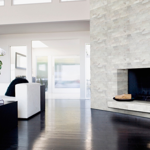 msi-cosmic-white-stacked-stone-marble-fireplace-in-white-and-black-living-room