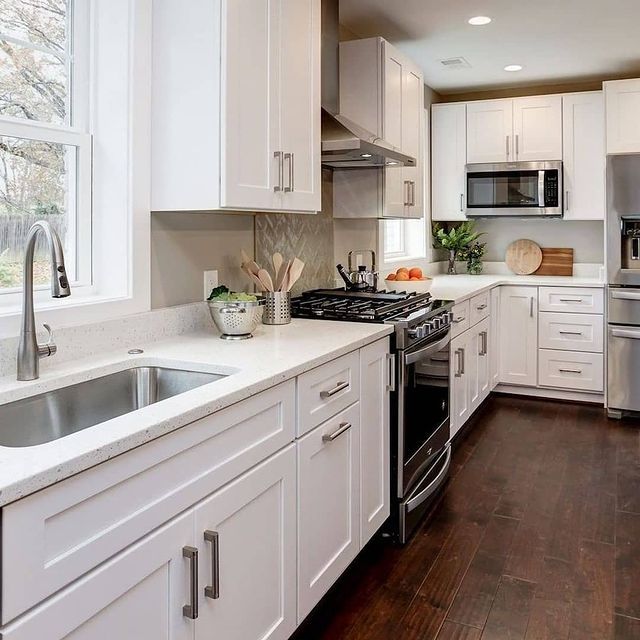 black quartz countertops white cabinets