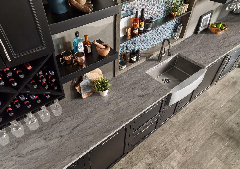 https://cdn.msisurfaces.com/images/blogs/posts/2022/12/msi-azul-celeste-granite-kitchen-bar-counter-july21-min.jpeg