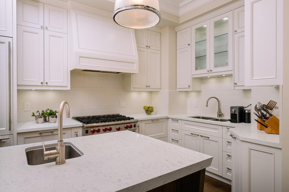 msi-carrara-lumos-quartz-countertop-with-delicate-veining-in-all-white-kitchen-july-2021-min