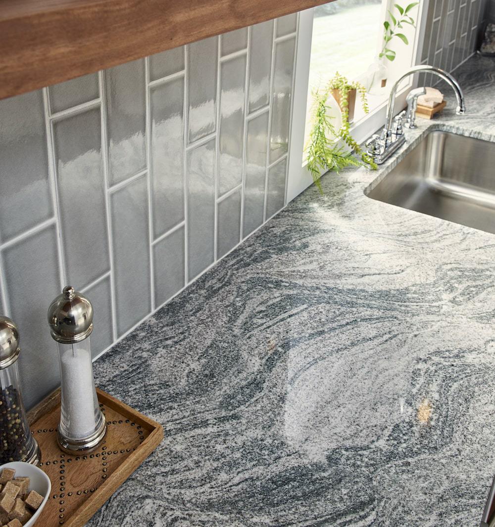msi-silver-creek-granite-kitchen-counter-close-up-with-subway-tile-min