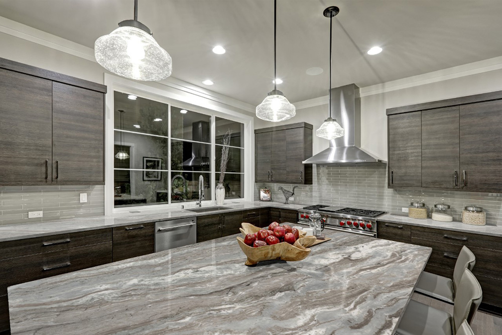 https://cdn.msisurfaces.com/images/blogs/posts/2023/04/msi-fantasy-brown-marble-kitchen-island.jpg