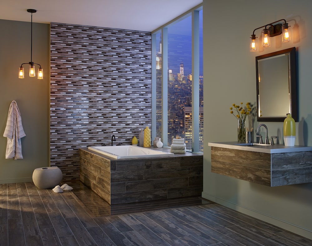 https://cdn.msisurfaces.com/images/blogs/posts/2023/04/msi-madison-avenue-glass-metal-tile-for-bathroom-feature-wall-min.jpg