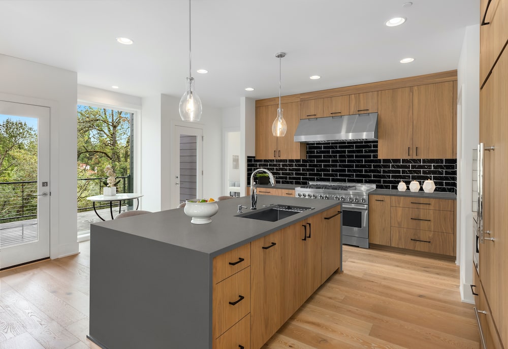 msi-macabo-gray-quartz-kitchen-with-black-subway-tile-min