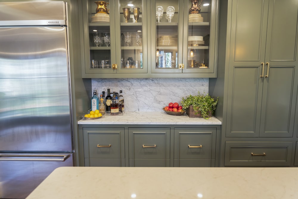 msi-carrara-white-marble-kitchen-counter-with-green-cabinets-min