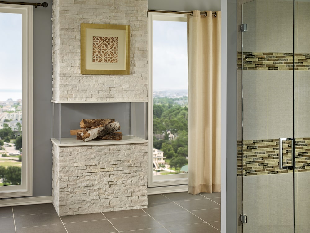 msi-arctic-white-stacked-stone-fireplace-in-bathroom-min