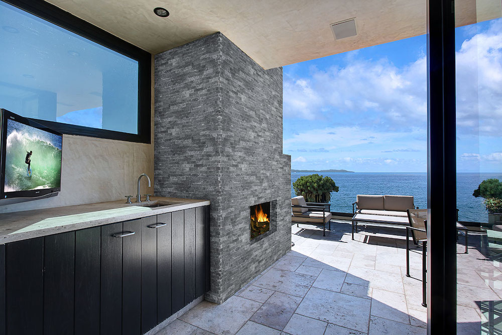 msi-cosmic-black-stacked-stone-in-outdoor-fireplace