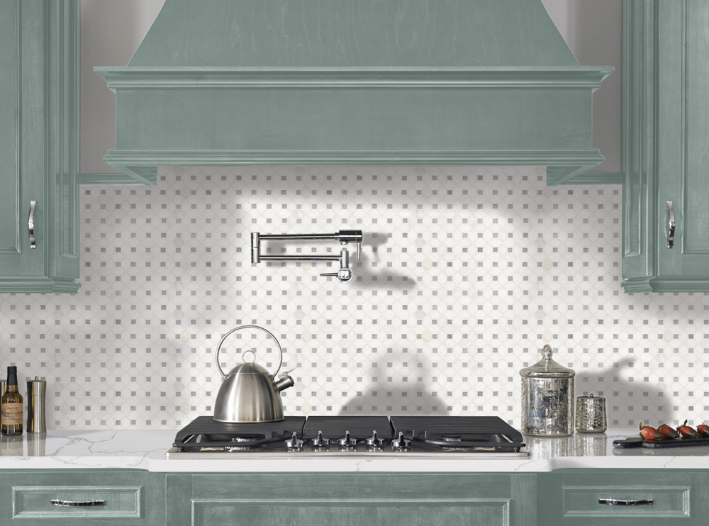 statuary-classique-quartz-bianco-dolomite-pinwheel-tile-midtone-green-blue-cabinets
