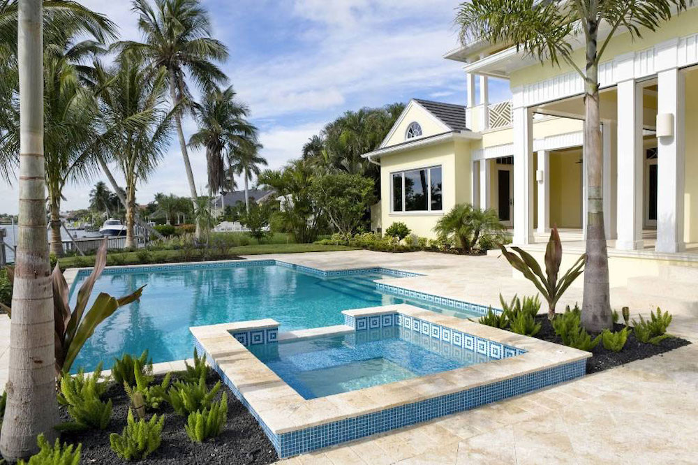 msi-tuscany-beige-tumbled-pavers-in-outdoor-poolside-patio