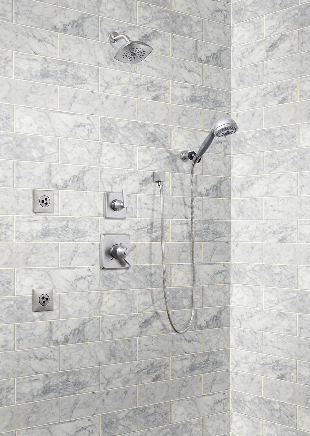 carrara-white-4x12-subway-tile-on-shower-wall
