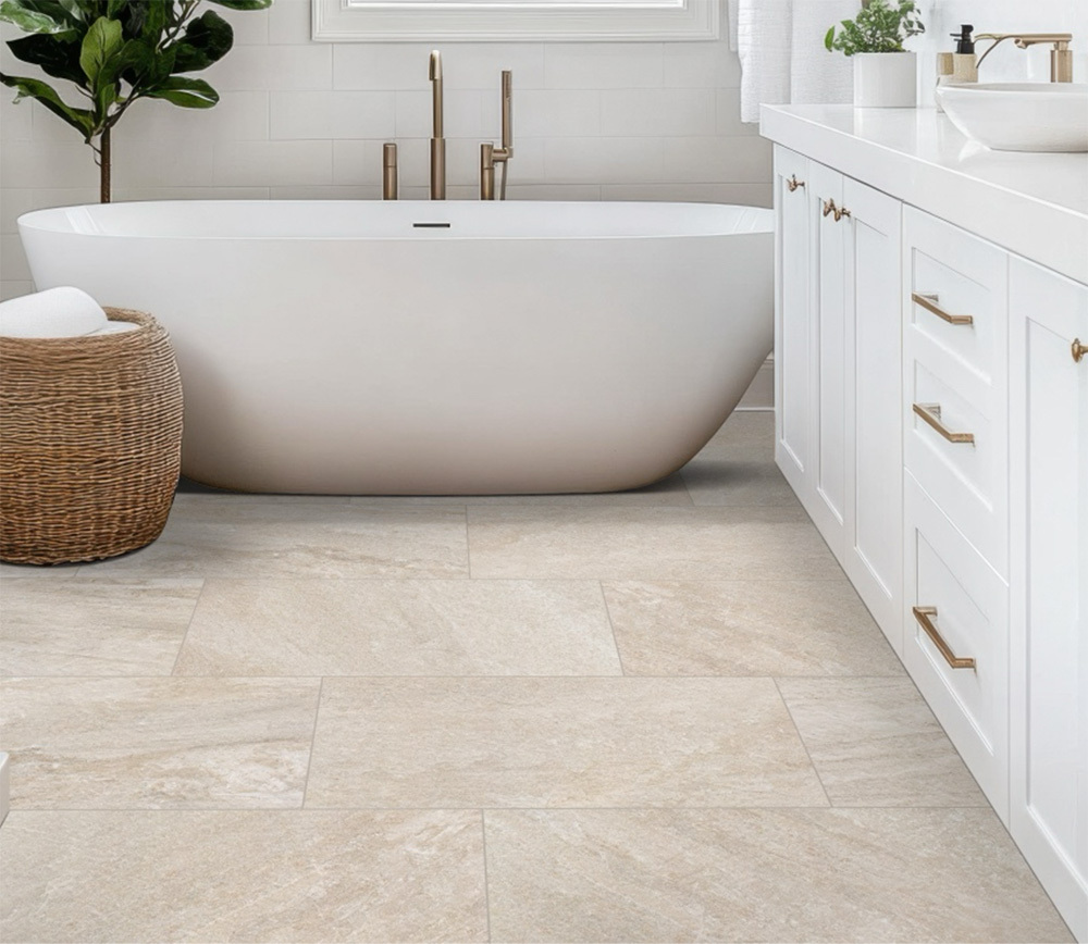 Traktion Stowe Desert Amber tile in a modern bathroom, showcasing its warm beige tones and superior slip resistance.