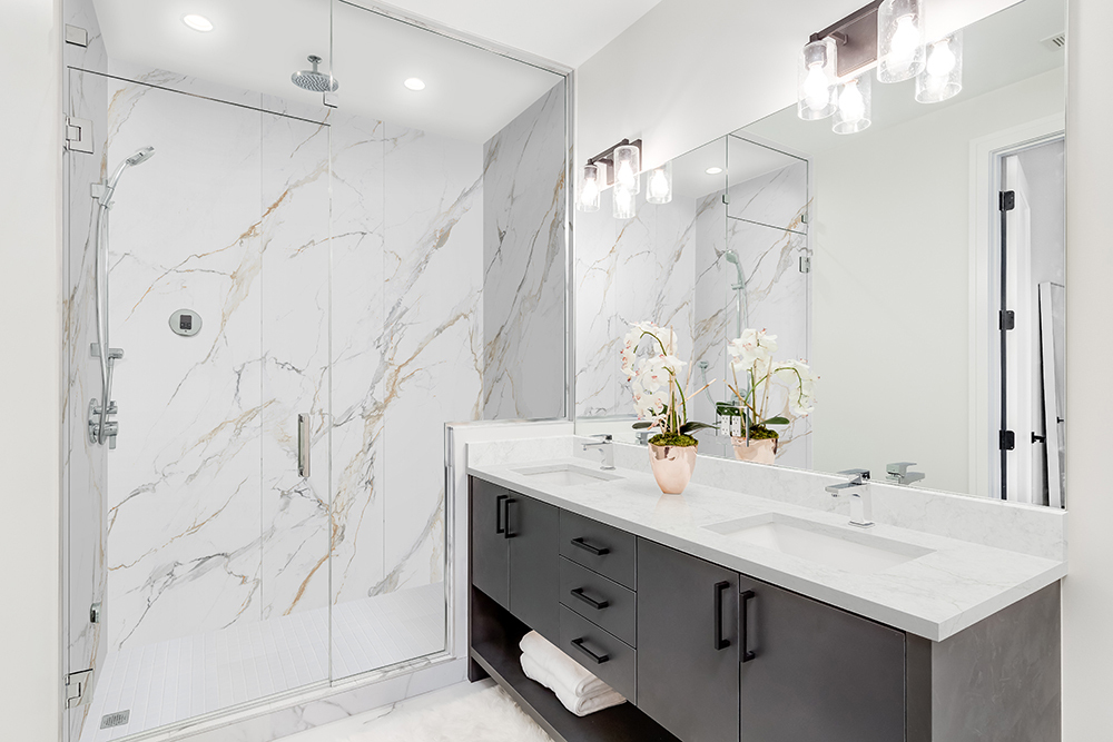 calacatta-golden-mist-porcelain-panels-shower-walls-domino-white-subway-tile-shower-floor