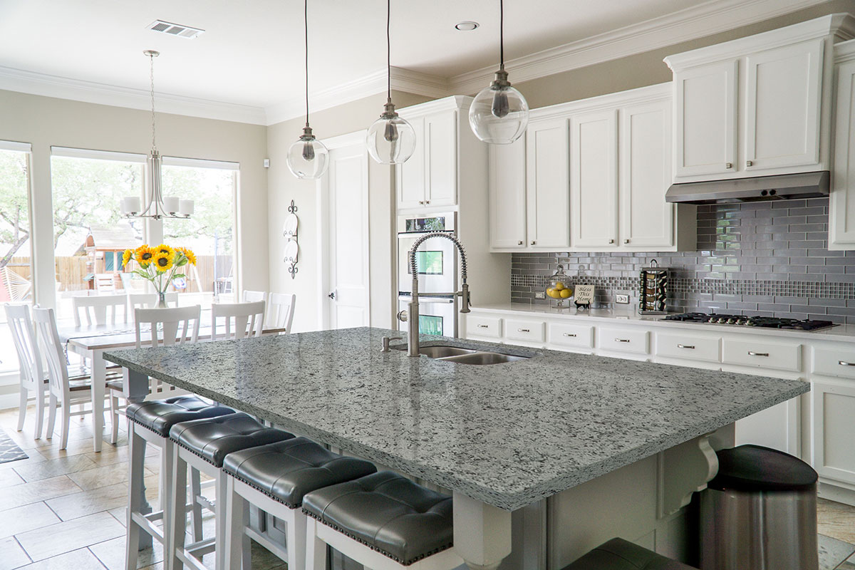 msi-white-napoli-granite-countertop-in-white-kitchen