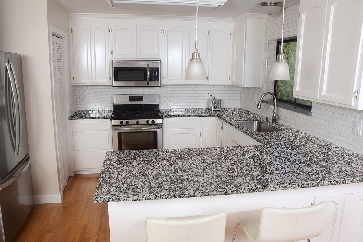 msi-gran-valle-granite-kitchen-countertop-with-white-cabinets