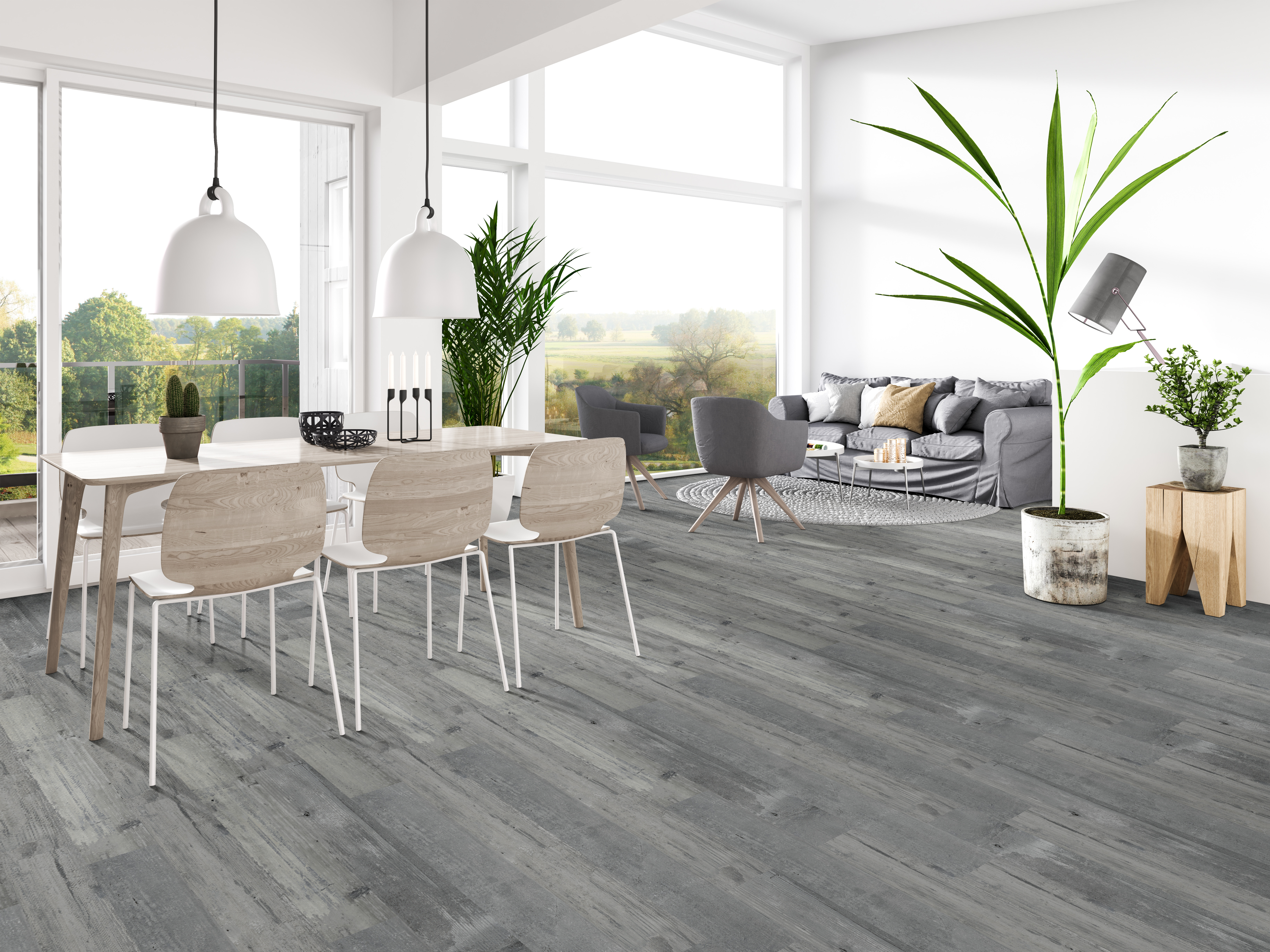 Open concept living area with grey vinyl plank flooring, illustrating the advantages of vinyl plank flooring in contemporary home designs.