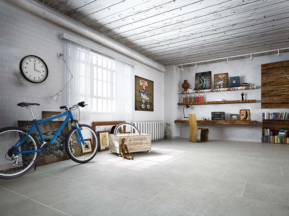 Creative studio with light gray large format porcelain tile flooring emphasizing durability for versatile settings.