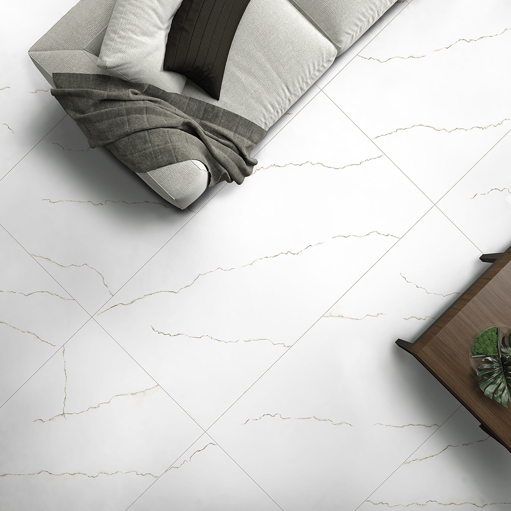 Top view of white marble-look large format porcelain tile with subtle veining and minimal grout lines.