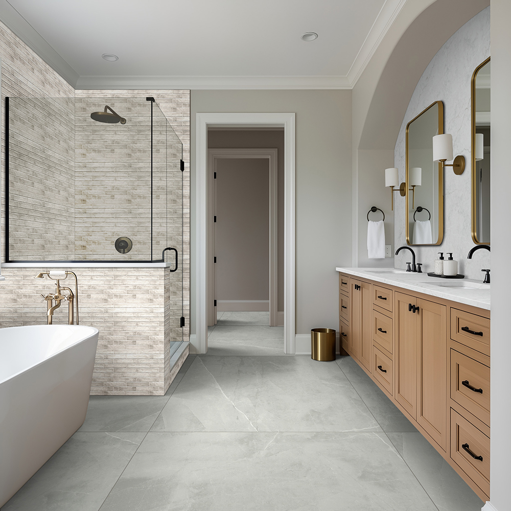 Modern bathroom features large format porcelain tile on floor and shower walls for a roomy, contemporary feel.