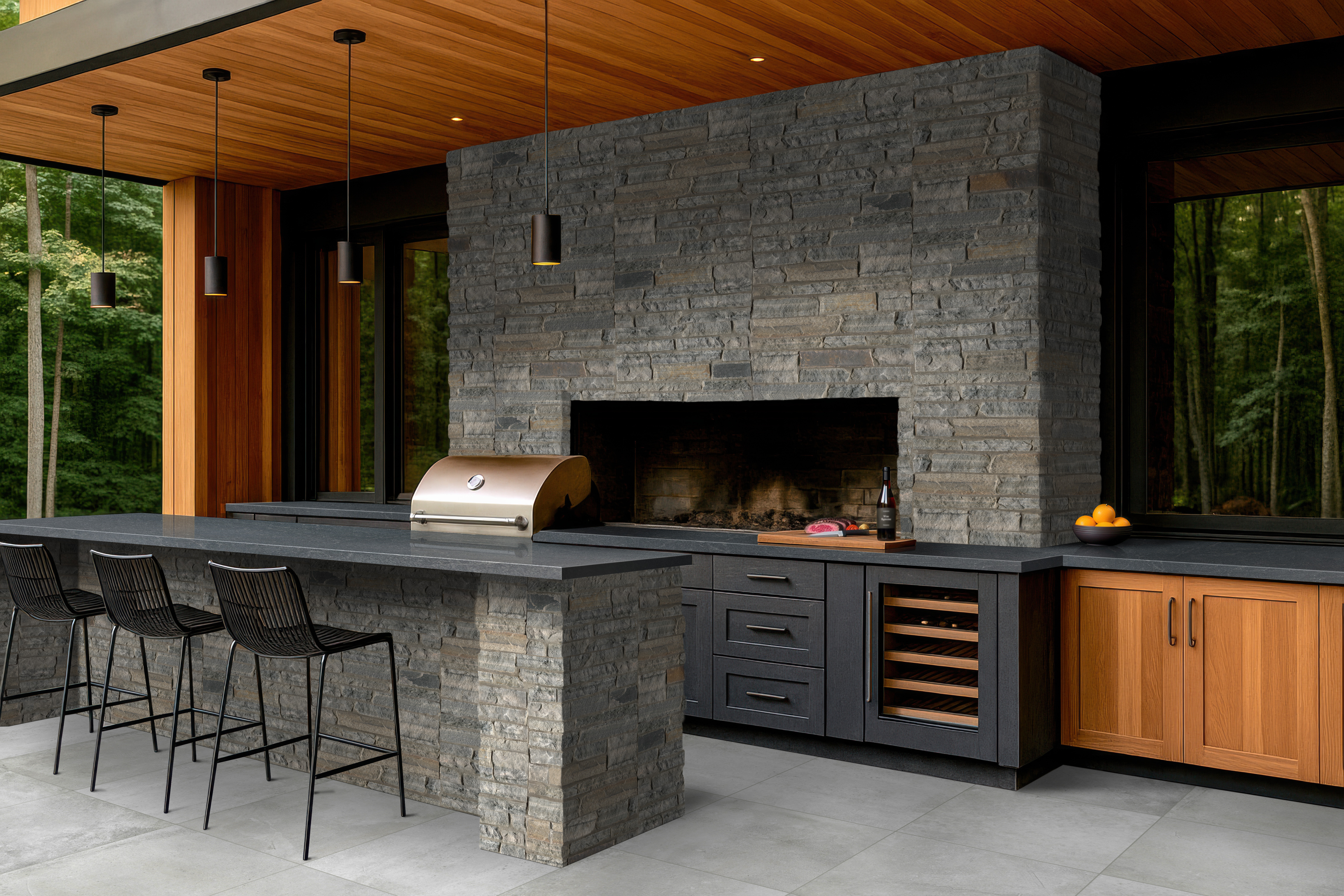 Nero Mist Granite countertops in an outdoor kitchen, demonstrating granite as a durable natural stone for exterior spaces.