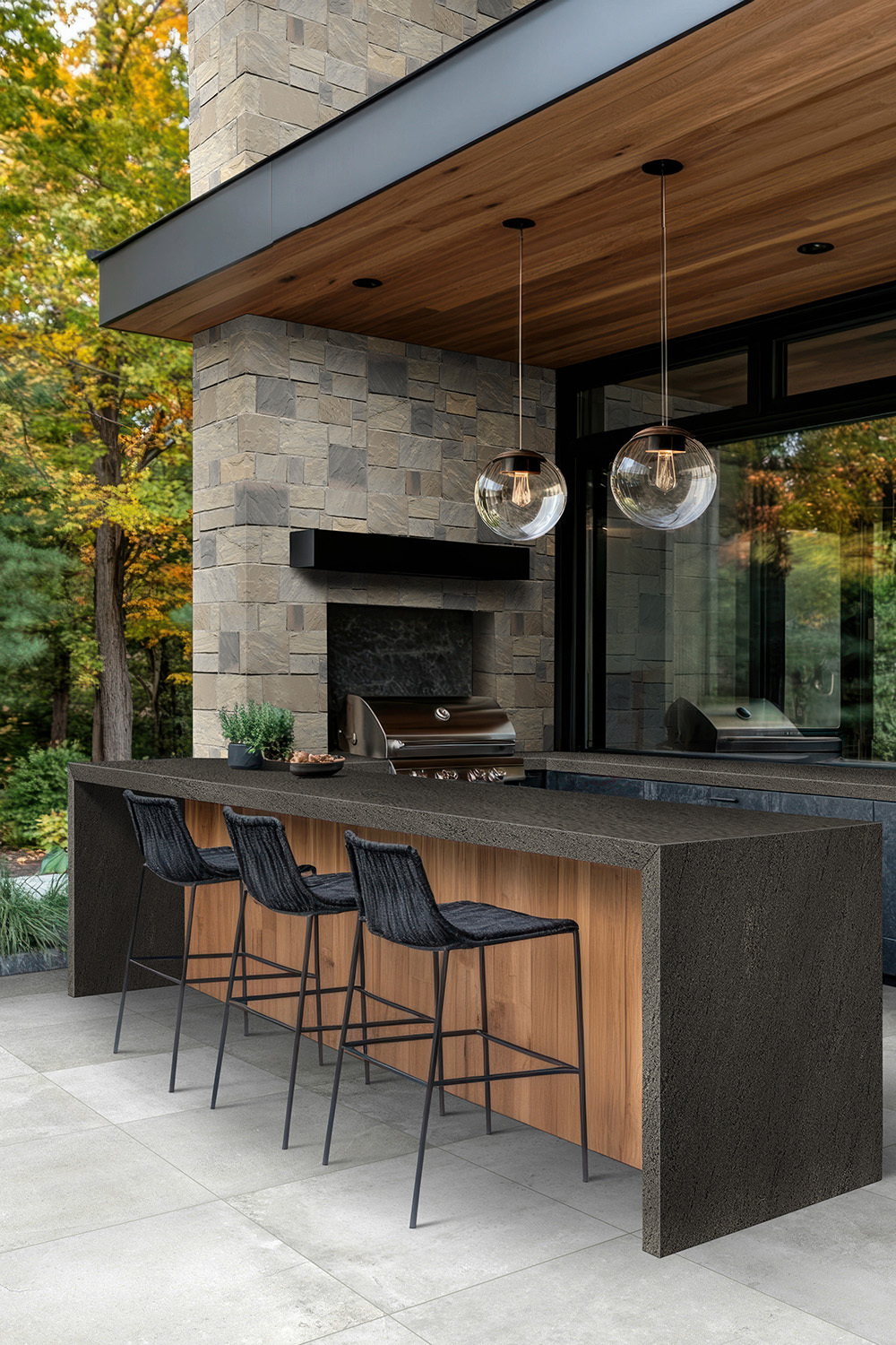 Porcelain slab countertops in an outdoor kitchen, exhibiting the porcelain slab thickness for outdoor entertaining spaces.