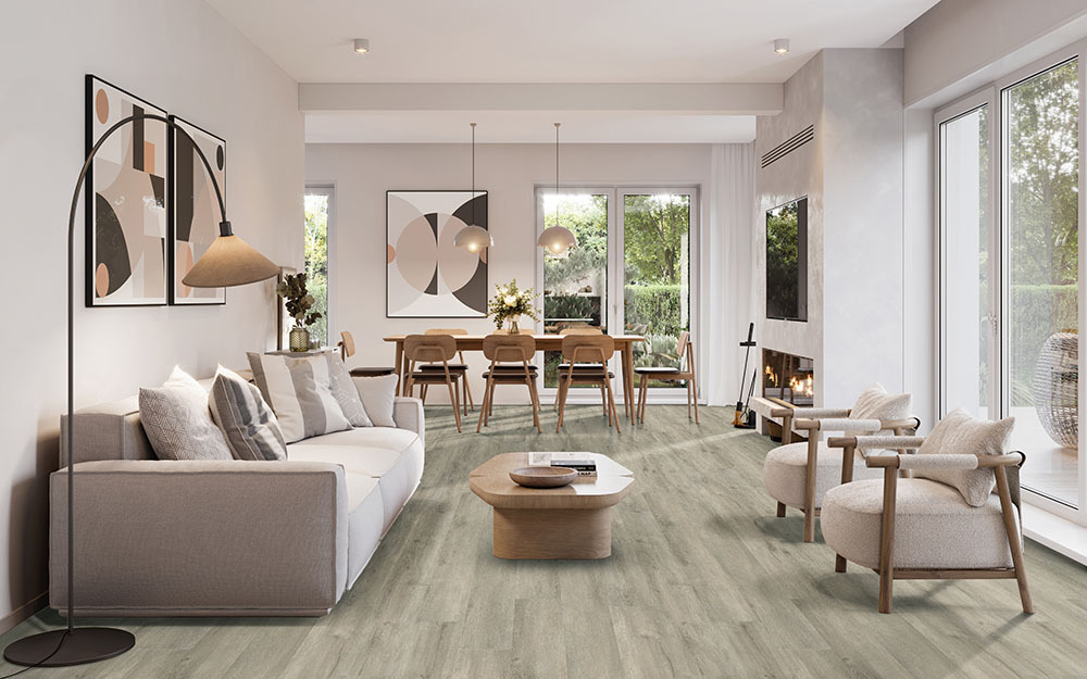 Light gray hybrid rigid core flooring throughout an open-concept living and dining room.