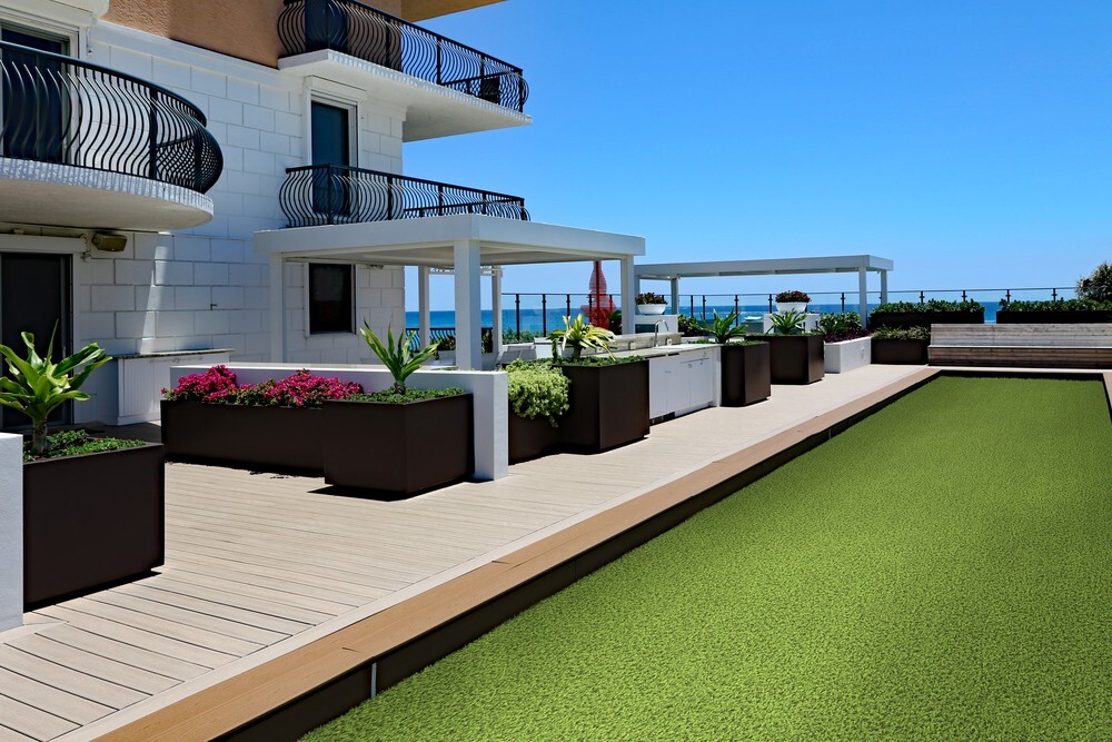 Commercial artificial turf installed on a rooftop amenity space, providing durable greenery for high-traffic outdoor areas.