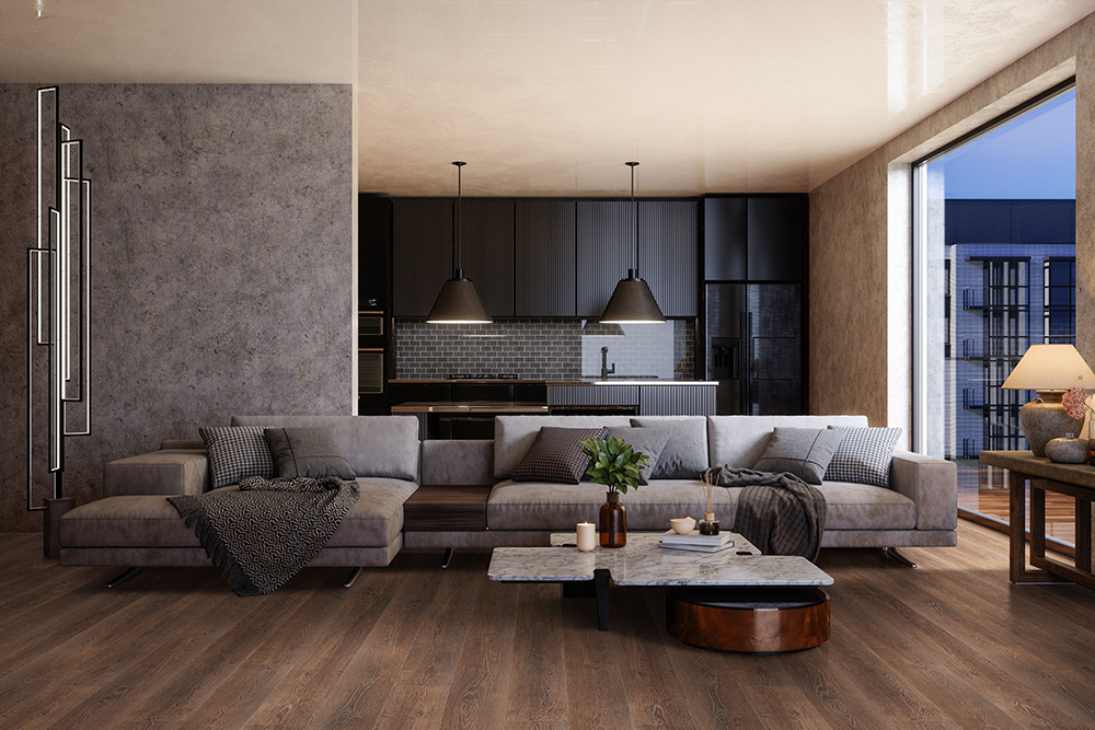 Open concept living room and kitchen with contemporary furnishings and dark wood-look waterproof hybrid rigid core flooring.
