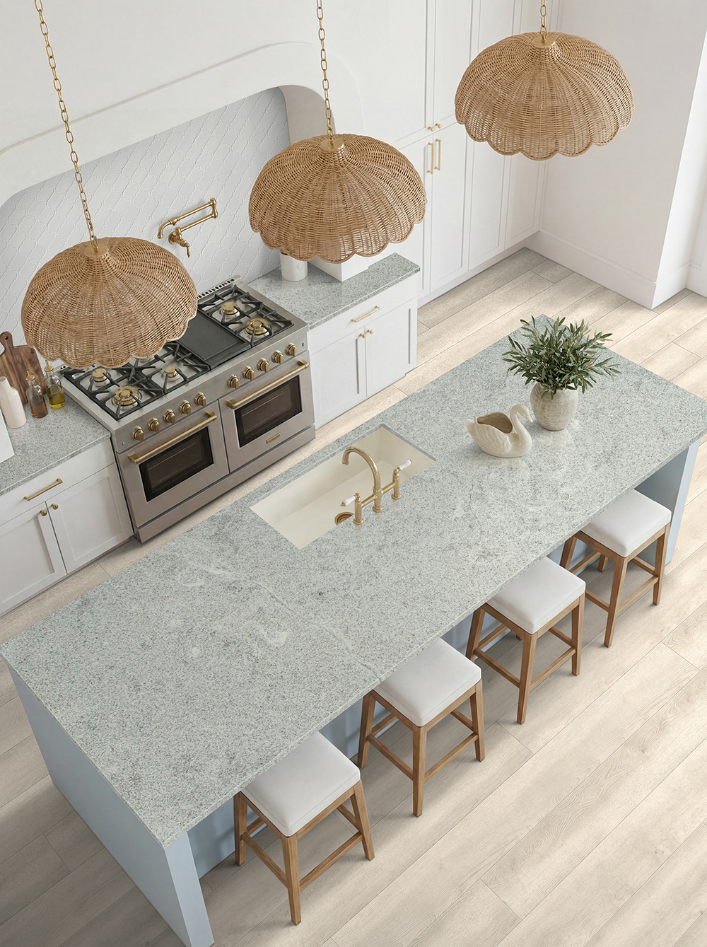 Bright kitchen with white cabinetry and spacious center island, light wood-look waterproof hybrid rigid core flooring.