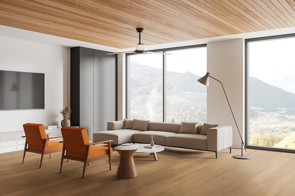 Contemporary living room with huge windows and natural wood touches, featuring light oak-look waterproof hybrid rigid core flooring.