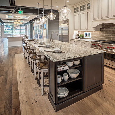 kitchen with quartzite countertop and luxury vinyl plank flooring