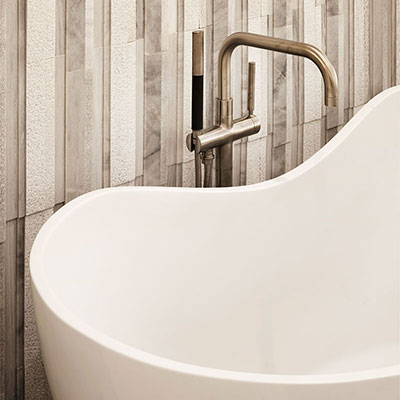 bathtub with vertical wall tile