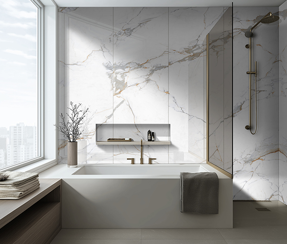 Bathroom with AquaLume porcelain panels in marble look tile design for walls and tub and shower.
