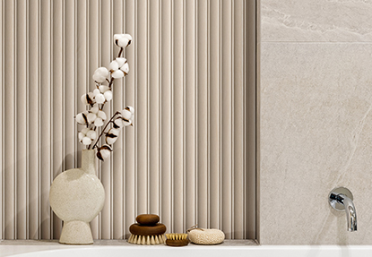 Bathroom wall with vertical fluted tile in neutral tones adding depth and texture to a modern vanity area
