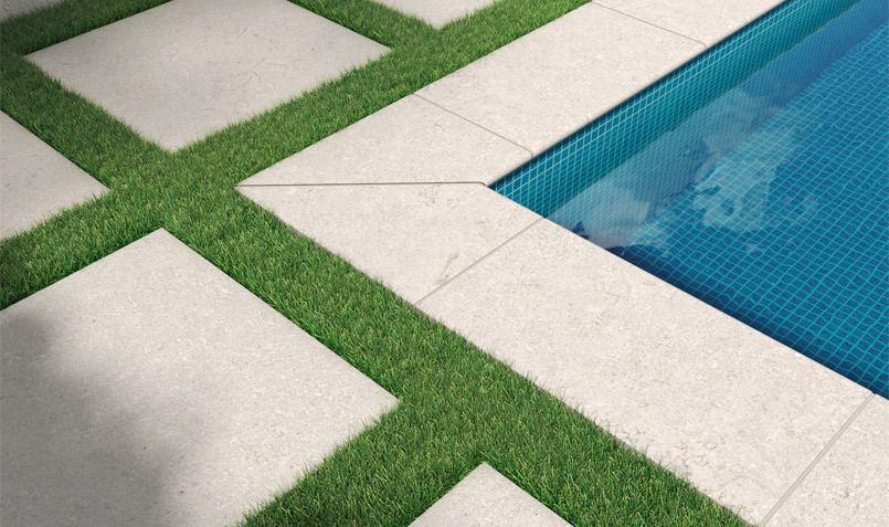 Livingstyle Pearl paver and coping around outdoor pool