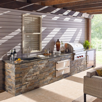 Stacked stone and veneers outdoor kitchen