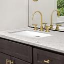 Quartz countertop and bathroom vanity with sink and mirror